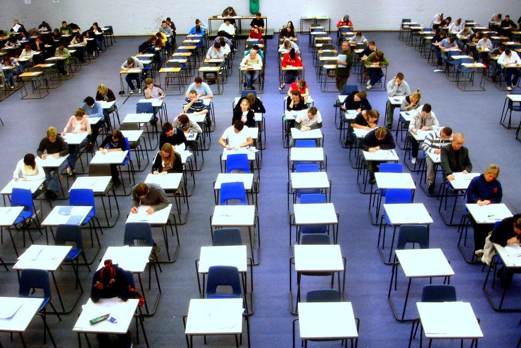 People taking exams in an on-site setting